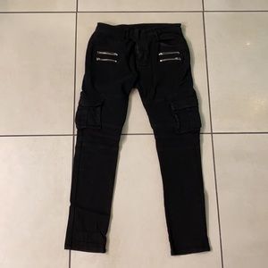 Black motorcycle style cargo pants. Skinny fit